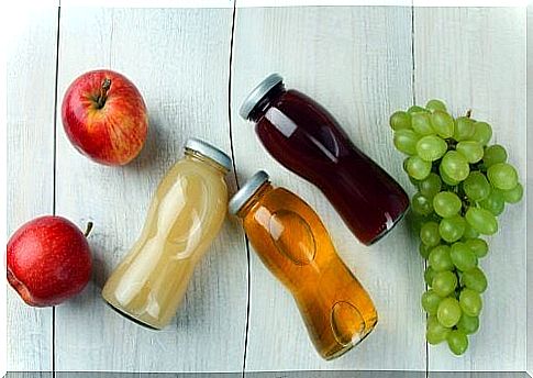 Soft drinks and fruit on a table