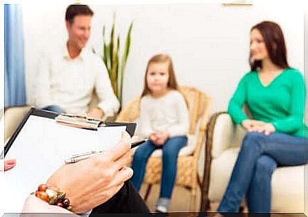 Couple with little girl during joint divorce.