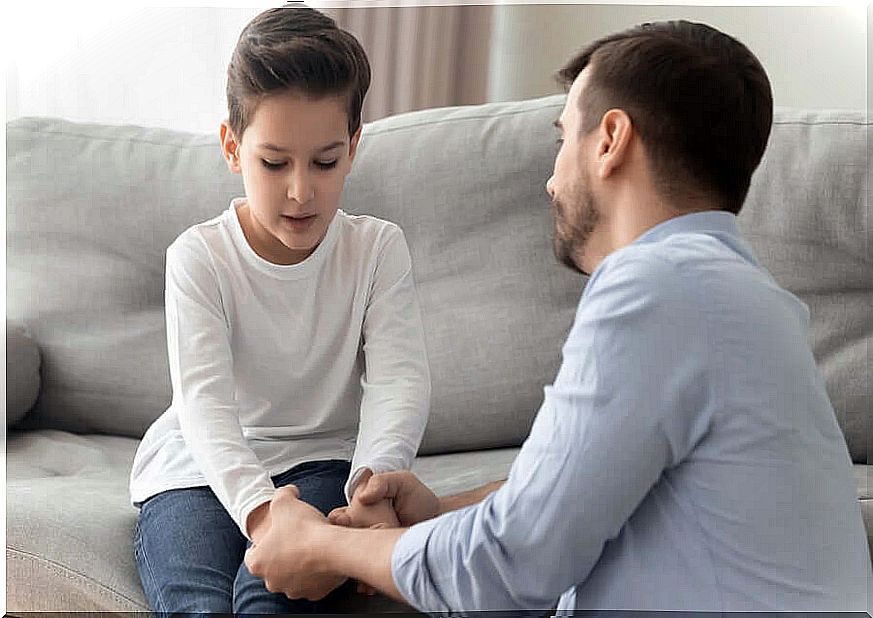 Father talking to his son.