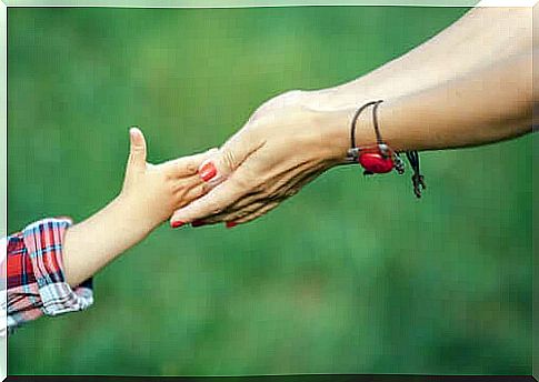 Hands mother and daughter.