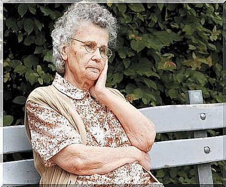 Old woman on a bench