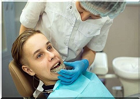 Dentist and patient with bruxism.  Temporo-mandibular joint.