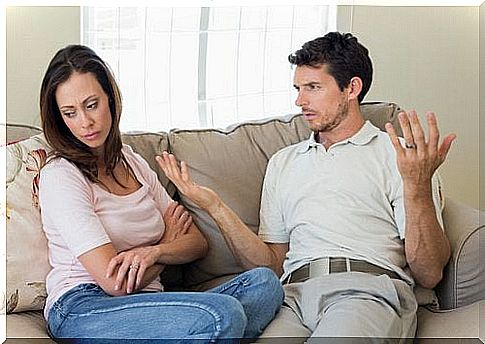 Couple arguing on the sofa