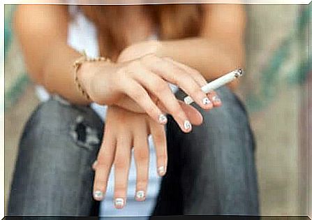 Girl with cigarette in hand